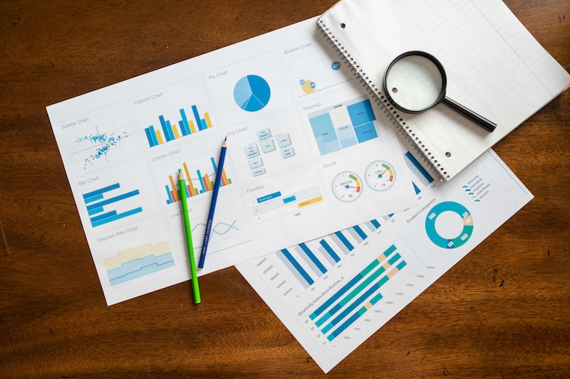 Boost your marketing - magnifying glass with charts